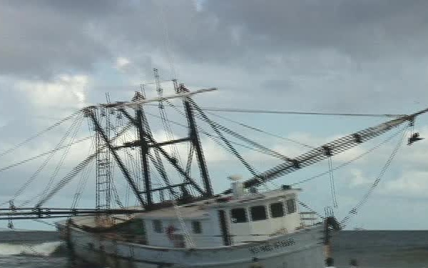 Fishing boat runs aground