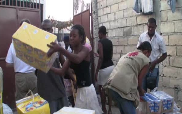 100211-G-9679C-Port-Au-Prince-NGO-Food-Distribution