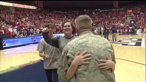 Airman Suprises Family Courtside