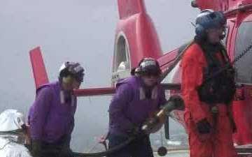 CGC Bertholf crewmembers hot gas HH-65 Dolphin helicopter