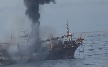 The Coast Guard cutter Anacapa sinks the derelict tsunami debris Japanese fishing vessel Ryou-Un Maru