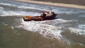 Grounded oil rig platform supply vessel