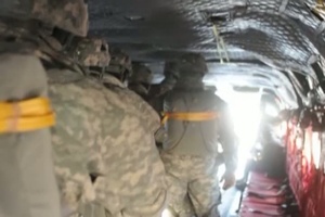 20140130- Paratroopers Board a Chinook at Bryant Army Airfield