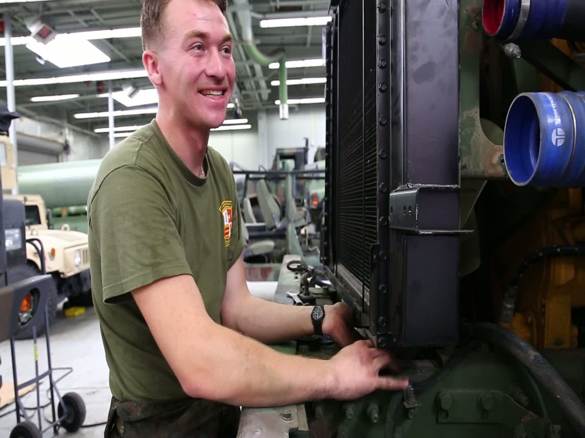 Cpl. John J. Brady, automotive organizational mechanic, General Support and Motor Transportation Company, Cambat Logistics Regiment 1, 1st Marine Logistics Group, speaks about his job aboard Camp Pendleton, Calif., Feb. 6.