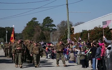 Local Students Add Cheer to Marines’ 9-Mile Hike