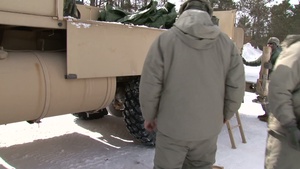 Michigan National Guard conducts cold weather sling load and howitzer live fire exercise