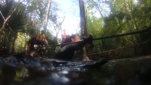 Mud, Sweat and Tears:  Runners temper their mettle during MARSOC Mud Run