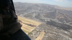 Broll of HMLAT-303 Performing Aerial Surveillance of MCB Camp Pendleton Wildfire
