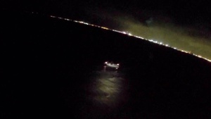 Coast Guard rescues 2 men, 1 child from sinking boat