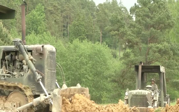 91st BEB And 444th Mobility Augmentation Company Set Up Defensive Obstacles