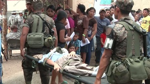 US and Guatemalan Soldiers Work to Provide Patient With Treatment