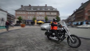 US and Belgian Motorbikers Ride Under Police Escort - Broll