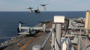 Special Purpose Marine Air-Ground Task Force-Crisis Response's Air Combat Element Supports the USS Bataan and 22nd MEU with Personnel and Supply Drop