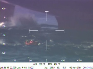 Coast Guard and local mariners rescue sailor in distress 450 miles southeast of Cape Cod, Massachusetts