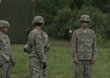 Field Artillery Shoots High with Medical Evacuation Training (B-Roll)