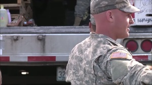 Soldiers help devastated community