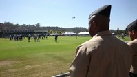 B-roll 3rd MAW Marines and Sailors watch San Diego Chargers practice