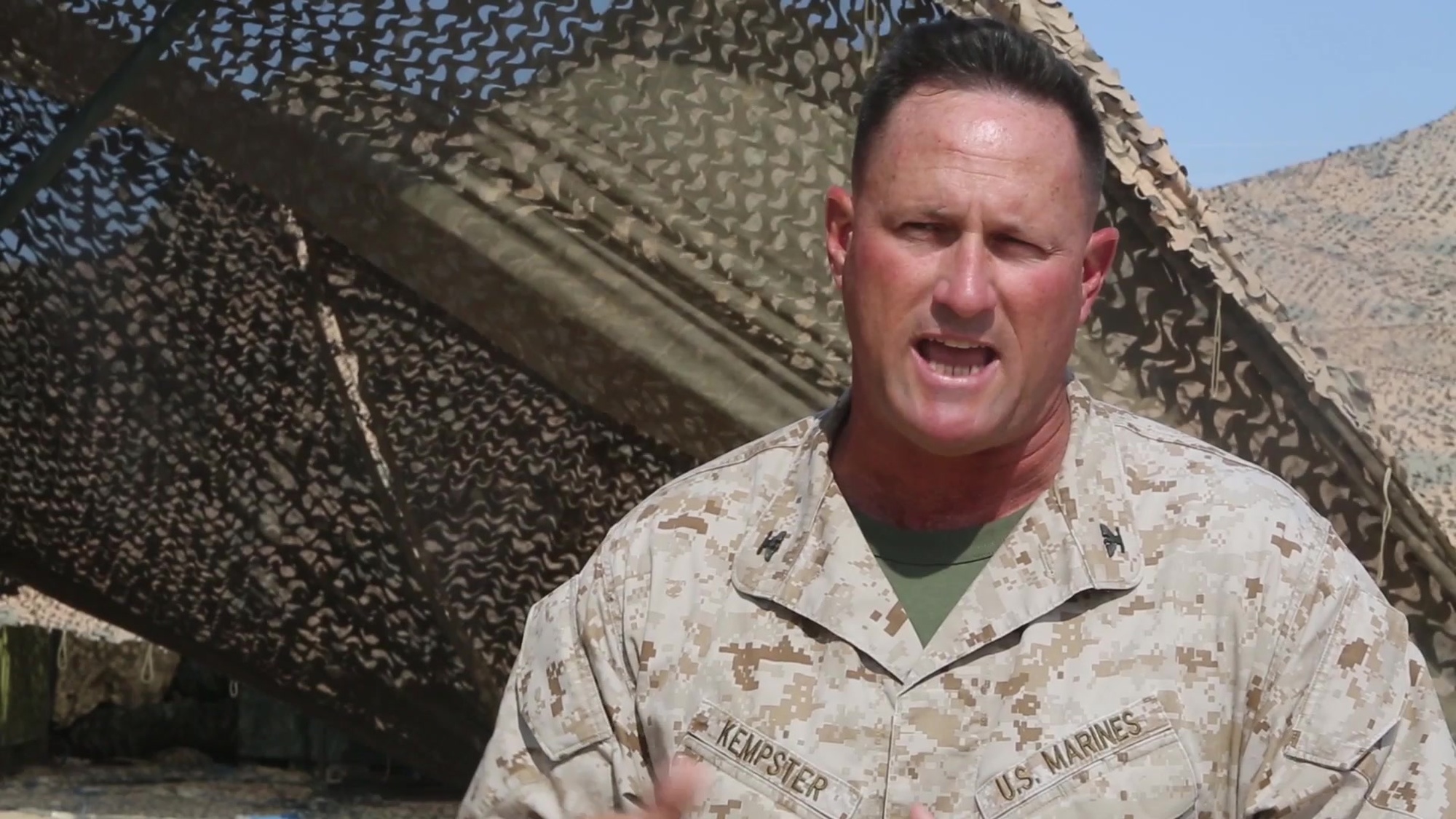 Colonel Kurt Kempster, the commanding officer of 1st Combat Logistics Regiment, 1st Marine Expeditionary Brigade explains how the logistics support element supports 1st MEB during Large Scale Exercise 2014 aboard Marine Corps Air Ground <br />Combat Center Twentynine Palms, Calif., Aug. 13, 2014. LSE-14 is a bilateral training exercise being conducted by 1st MEB to build U.S. and Canadian forces’ joint capabilities through live, simulated, and constructive military training activities.