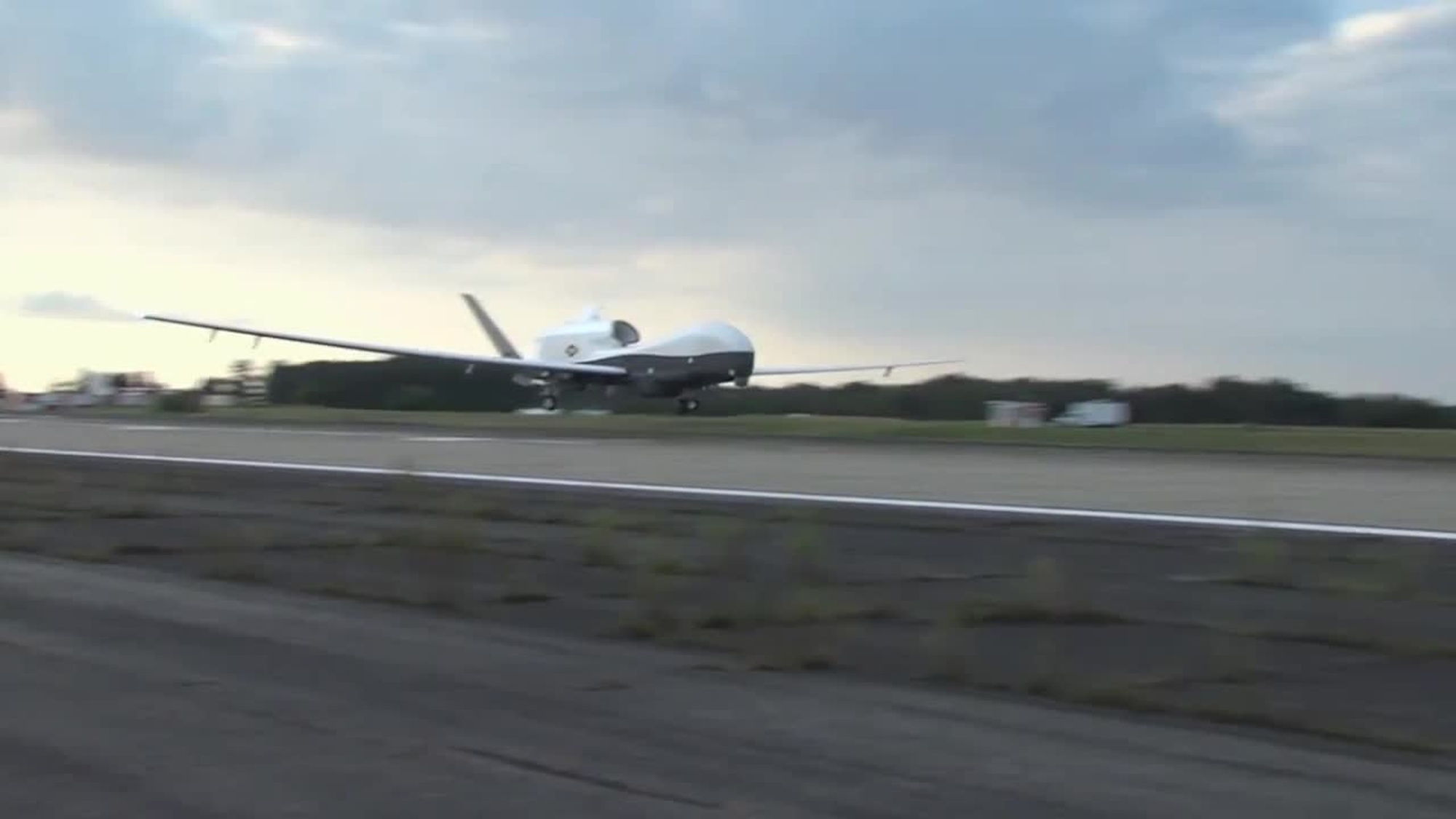 The MQ-4C Triton Unmanned Aircraft System completed its first cross-country flight early today.<br /><br />Watch as MQ-4C Triton, the Navy&#39;s largest unmanned aircraft, lands at 7:53 a.m. Sept. 18 at Naval Air Station Patuxent River, Md. Its debut at Patuxent River marks the transition from initial flight test to testing that will demonstrate the Triton&#39;s capability to perform operational missions in the maritime domain. Rear Adm. Mat Winter, who oversees Unmanned Aviation and Strike Weapons at NAVAIR, and Capt. Jim Hoke, program manager of Triton&#39;s Persistent Maritime Unmanned Systems Program Office, provide commentary.