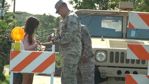 Hawaii National Guardsmen Pass Out Candy to Trick or Treaters, Patrol Neighborhoods as Lava Flow Continues