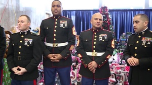 Secretary of State John Kerry donates to Marine Forces Reserve Toys for Tots Campaign