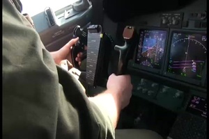 Pilots Flying Low Altitude and Looking Out the Window at the Water