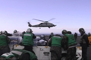 Helicopters Land on Flight Deck of USS Ronald Reagan (CVN 76) in Japan Relief Effort