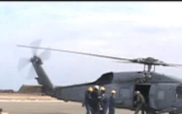 Unloading a Helicopter Sent from USS Ronald Reagan (CVN 76) in Japan Relief Effort