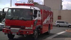 B-roll of Japanese Firefighters Conduct Annual Training