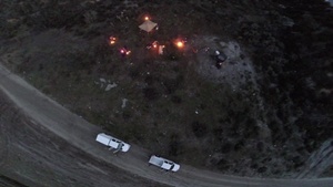 Aerial Footage of Military Combat Cameramen Training in Combat Tactics