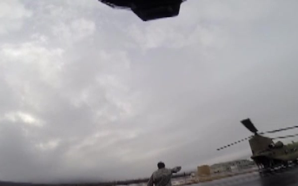 Jumpmaster jumps from CH-47 Chinook to earn master parachutist badge