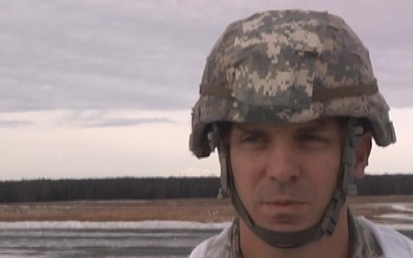 Jumpmaster jumps from CH-47 Chinook to earn master parachutist badge