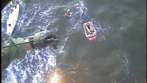 Coast Guard rescues 3 from grounded vessel