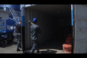 B-Roll of Minesweeper Entering Dry Dock