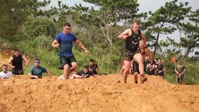 See How 4,500 Muddy Marines and Okinawans Build Relations