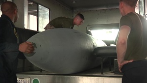 B-roll of Ground support equipment Marines supporting Marine squadron with gear