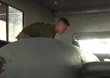 B-roll of Ground support equipment Marines supporting Marine squadron with gear