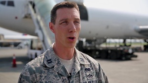 U.S. Airmen and Nepalese Soldiers Unload Aid for Nepal - (without titles)