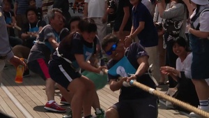 Sailors from USS Shiloh Compete in a Tug-of-War Tournament during the Black Ship Festival