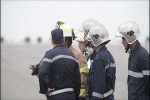 Firefighters Work Together