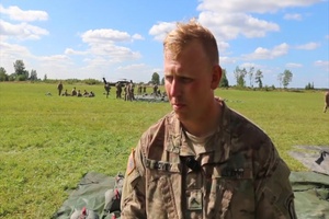 U.S. and Estonian Soldiers Perform Joint Helicopter Jump