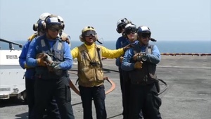 USS Essex Sailor Conduct Crash and Salvage Training