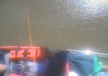 Injured Man Waits for Coast Guard assistance