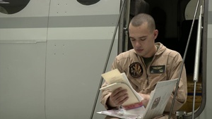 B-Roll of a crewmaster working on a C-12 Huron and a C-12 Huron taking off