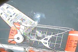 Coast Guard Aircrew Dewaters Sailboat and Conducts MEDEVAC on Lake Huron