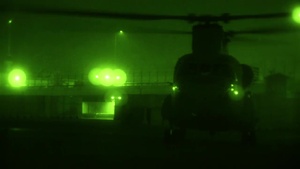 Soldiers download equipment from a CH-47 Chinook