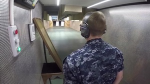 U.S. Navy Sailors assigned to USS Mount Whitney (LCC-20) shoot with M-9 Beretta pistol at Caserma Ederle Vicenza