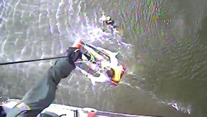 Helicopter crew rescues man overboard from sailboat