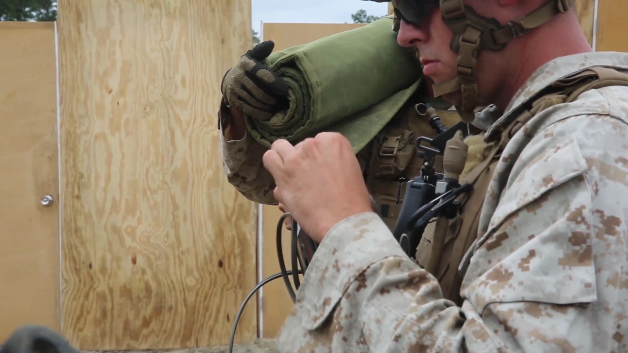 30 Marines with Alpha Company, 2nd Combat Engineer Battalion, worked cohesively with Marines from 2nd Battalion, 2nd Marine Regiment, during a demolitions exercise aboard Camp Lejeune, N.C., constructing urban charges to blow off wooden doors from the hinges, water charges to destroy metal doors and Bangalore&#39;s, which are used to destroy concertina wire and barbed wire foot traps Sept. 22, 2015.