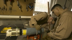 Steady Hands: EOD Technicians Disarm Griffin Missile